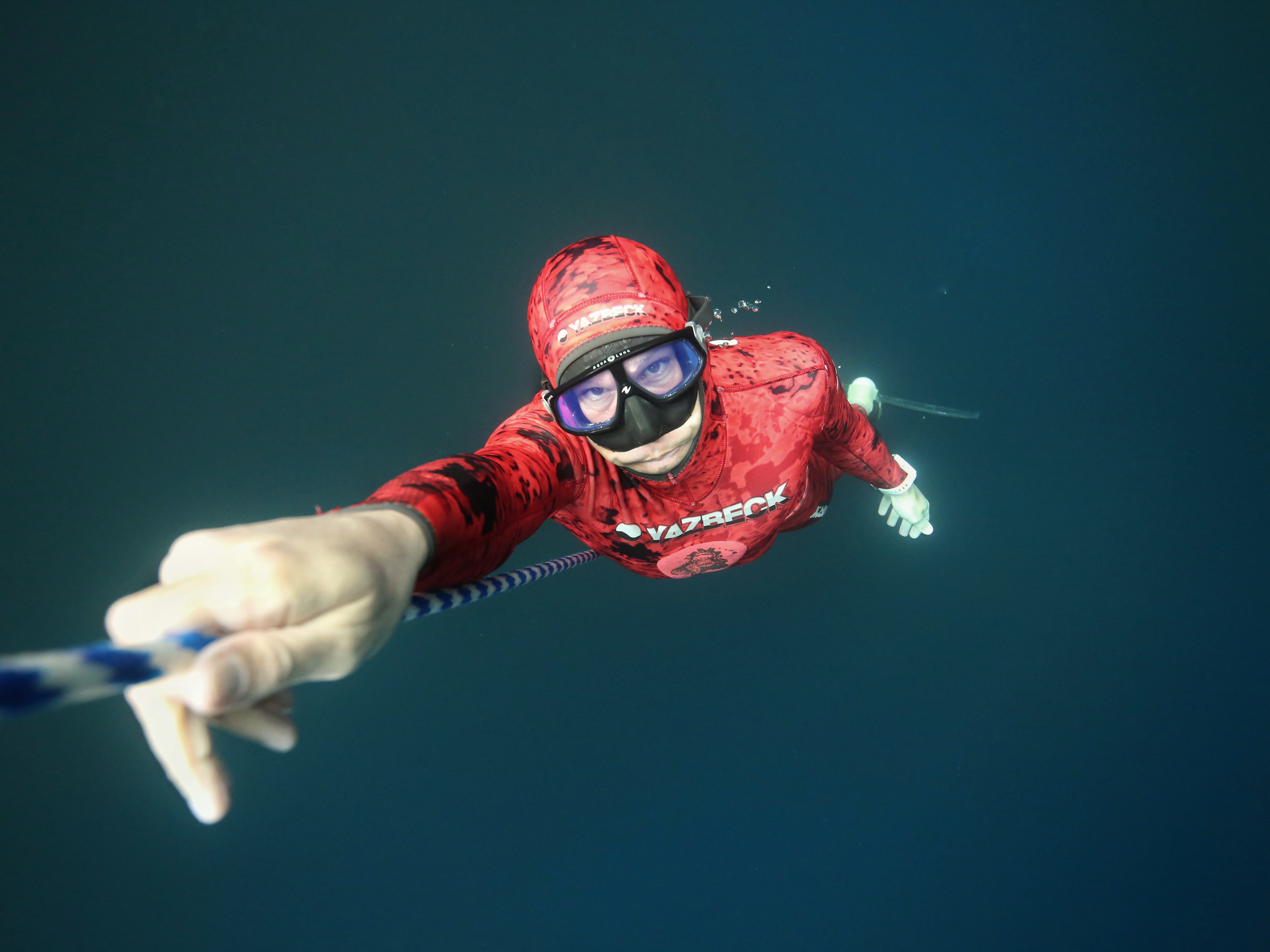 Freediver Jake ascending the line in cenote Angelita